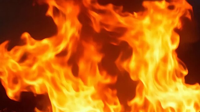 Intense orange fire flames burning background