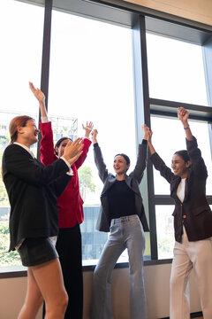 Group of people United Hands to built teamwork together with Spirit - teamwork concepts.
