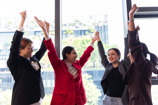 Group of people United Hands to built teamwork together with Spirit - teamwork concepts.