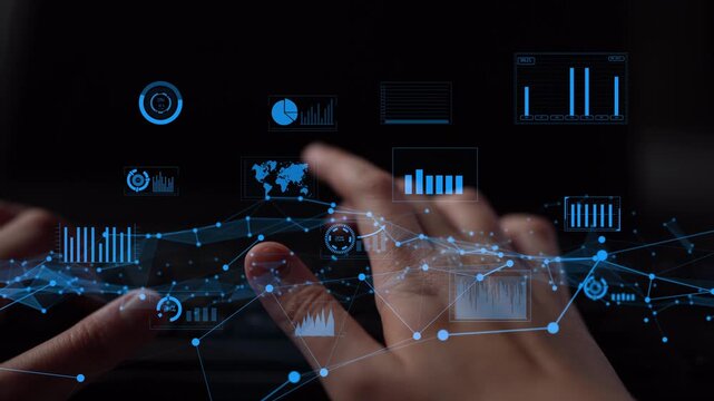 Dynamic workspace scene showing hands working on a laptop, surrounded by blue digital graphs and visualizations, emphasizing technology and data analytics trends. Xenic