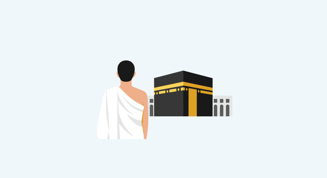 Muslim pilgrim in ihram standing before the Kaaba in Mecca.