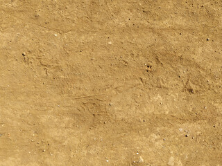 Dry sandy soil texture field overhead background