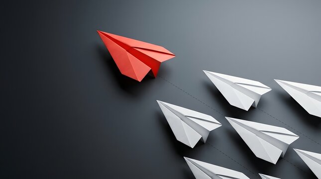 Red paper airplane leading a fleet on a dark background representing elite business strategy and clear leadership vision
