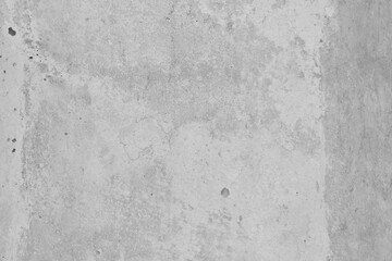 Naklejka premium Gray concrete texture background with a rough, weathered surface and subtle variations