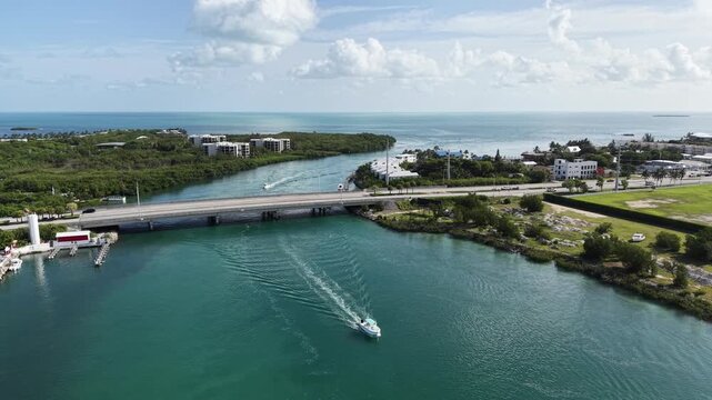 Still shot of fishing boats heading from the Gulf to the Atlantic Ocean through the Vaca Cut channel at Marathon in Florida Keys