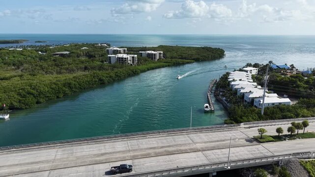 Aerial view of fishing boats heading from the Gulf to the Atlantic Ocean through the Vaca Cut channel at Marathon in Florida Keys