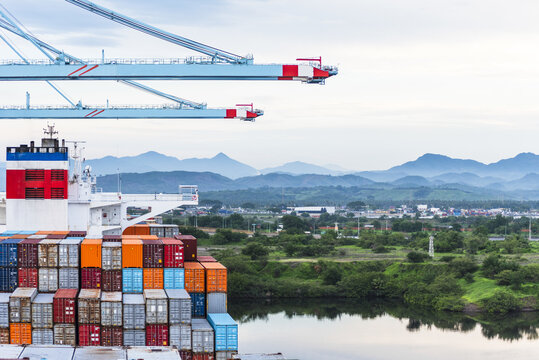 Container vessel undergoing port operations at container terminal in L&aacute;zaro C&aacute;rdenas, Mexico.
