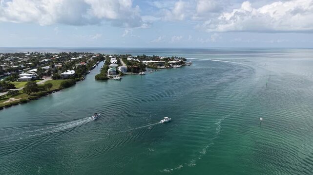 Aerial view of fishing boats navigating the Vaca Cut channel at Marathon in Florida Keys. 