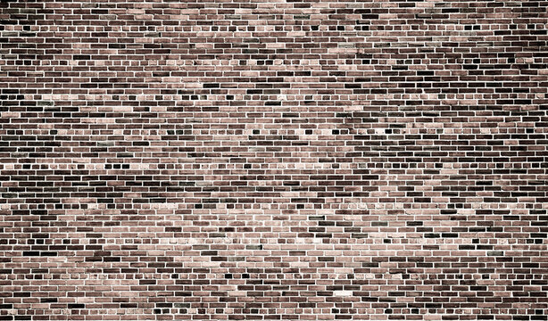 Texture background shows old brick surface. Texture wall creates aged masonry pattern. Industrial facade uses texture design detail. Traditional brickwork forms texture construction backdrop.