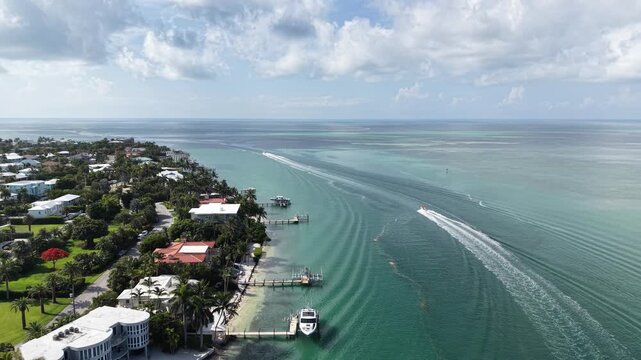 Aerial view of fishing boats headed to the Atlantic Ocean from the Vaca Cut channel at Marathon in Florida Keys. 