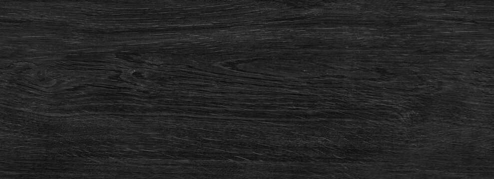 Black wood dark seamless texture background. Top view of wooden grain pattern.