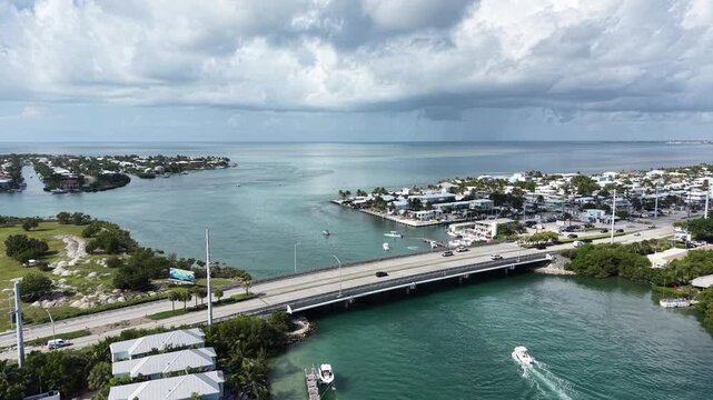 Aerial still shot of a fishing boat navigating the strong current in the Vaca Cut channel at Marathon in Florida Keys