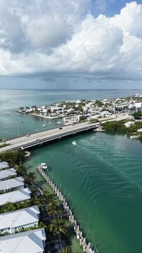 Aerial view of a fishing boat heading through the Vaca Cut channel from the Gulf to the Atlantic at Marathon in Florida Keys