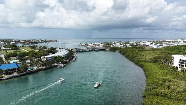Aerial view of fishing boats navigating the Vaca Cut channel at Marathon in Florida Keys