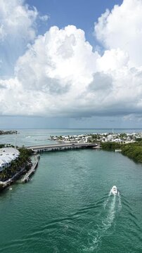 Still shot of a fishing boat navigating the current in the Vaca Cut channel at Marathon in Florida Keys