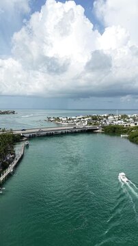 Aerial view of a fishing boat heading through the Vaca Cut channel at Marathon in Florida Keys