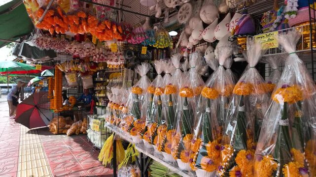 Outdoor Flower Stall Selling Marigold Garlands in Bangkok Thailand