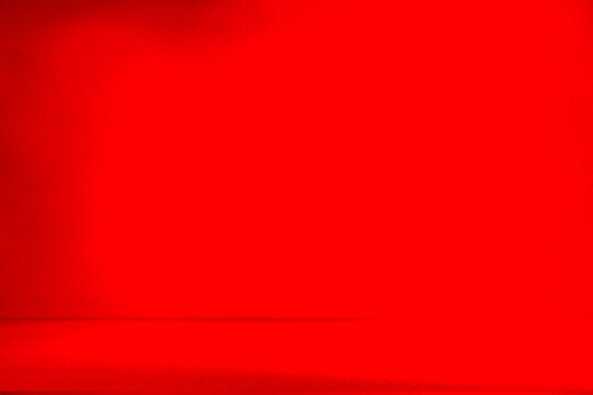 Wall interior background, studio and backdrops show products.with shadow from window color Red background for text insertion and presentation product	