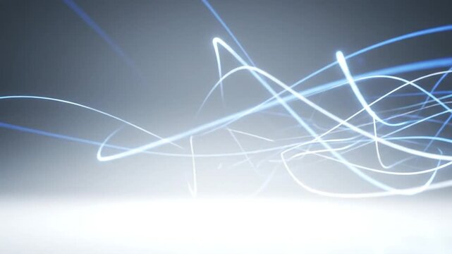 Dynamic blue abstract light trails forming energetic wave patterns on dark gradient background.