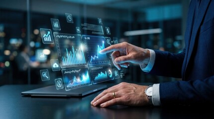 Fototapeta premium Businessman interacting with virtual data graphs on a tablet