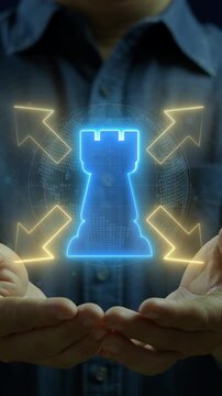 Businessman's hands protecting glowing chess rook castle with outward expansion arrows icon. Neon blue and yellow lighting, corporate infrastructure strategy and business diversification concept.