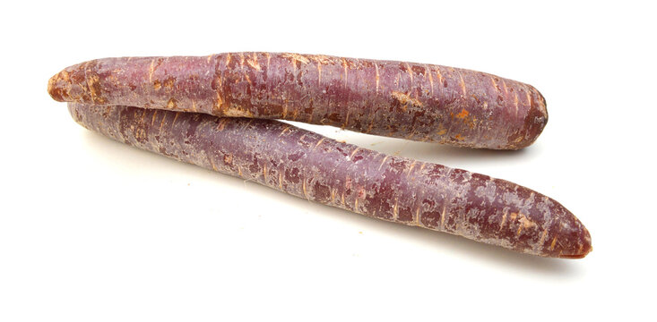 Bunch of fresh organic rainbow carrots isolated on white