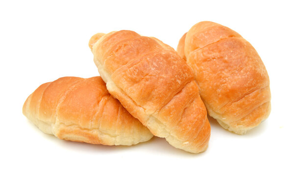 Fresh and tasty croissant over white background 