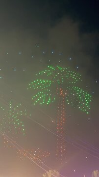 Glowing Coco de Mer drone formation lighting up the night sky at Stad Linite, Mahe, during the Seychelles 50th Independence Day Golden Jubilee celebrations