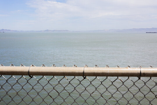 San Francisco Bay view through chain link fence at Alcatraz