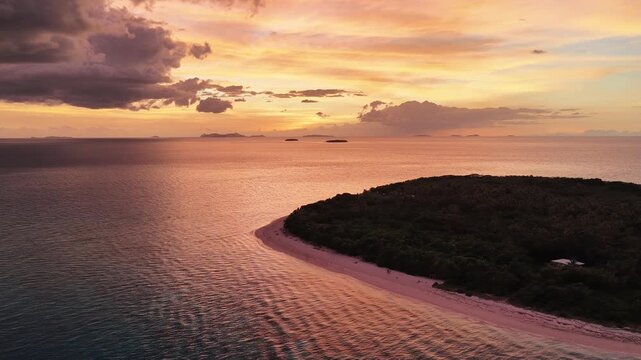 Drone view of a sunset sky over the ocean, Serenity Island, Fiji