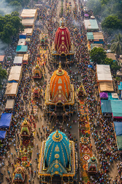 Jagannath rath yatra parade with ornate chariots and vibrant street decorations during traditional rath yatra festival attracting pilgrims from across india annually