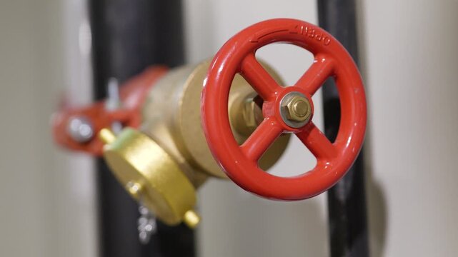 Red wheel valve on commercial fire protection pipeline system