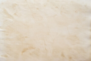 Fototapeta premium Old vintage paper texture background with aged stains and antique yellowed parchment effect