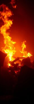 Gentle tremor of a contained inferno, veiled in hazy illumination, dutch tilt,  minimalist,  ambient