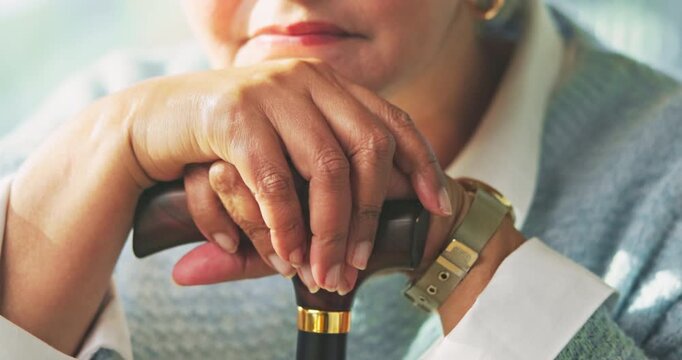 Old woman, hands and cane for retirement, support or mobility aid for recovery in home. Senior person with a disability, walking stick and healthcare for arthritis help, assistance or balance