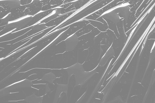 transparent plastic film wrap overlay texture on black background
