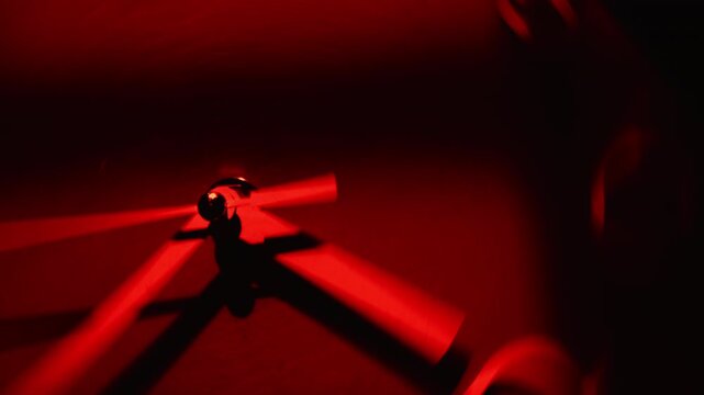 Spinning Red Clock Symbolizing Time Manipulation, Reality Distortion, and the Flow of Past, Present, and Future