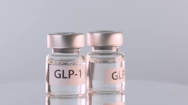 Clinical medical weight management therapy using clear glass vial liquid injection medicine offers hopeful health treatment relief solution