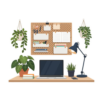 Home office setup with plants and pegboard