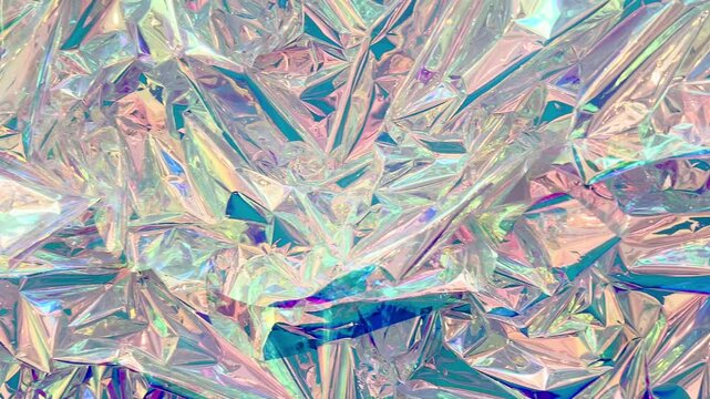 Close up of shiny holographic foil texture with rainbow colors and crystal pattern