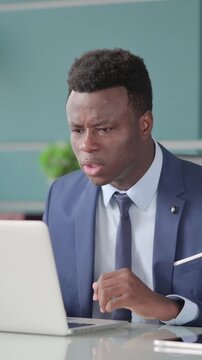 Angry African Man Fighting, Arguing while using Laptop, Vertical Video