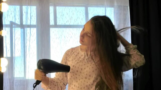 Side View Woman Drying Long Hair With Hairdryer