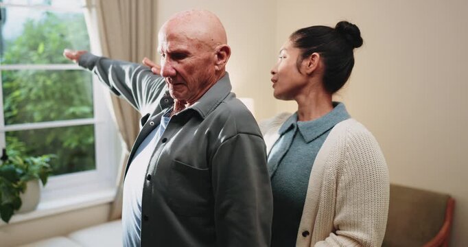 Elderly, man and stretching in clinic with physiotherapist, wellness and support for injury recovery. Senior person, arm exercise and healthcare worker talk with advice, rehabilitation or assistance.