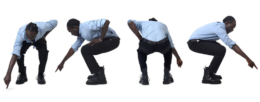 the same crouching man pointing his finger downwards