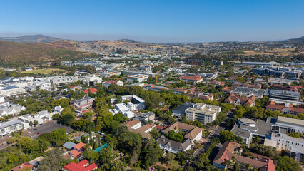 Stellenbosch, South Africa - January 24, 2026: Aerial view of Stellenbosch on a sunny summer day. Blue skies and charming architecture showcase one of the Cape Winelands' most beautiful towns.