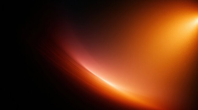 Abstract glowing orange light streak with dark background