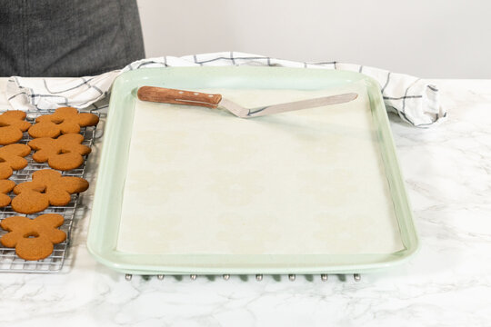 Preparing and Baking Classic Gingerbread Cookies in Gingerbread Man Shapes