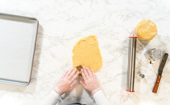 Cutting Flower Cookies for Easter Sandwiches