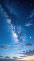 Fototapeta premium Vertical view of starry night sky with milky way galaxy, soft clouds. Bright blue cosmic background with glowing stars for mobile phone wallpaper. Beautiful outer space scene with nebulas, dark