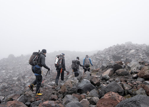 Russia, Upper Baksan Valley, Caucasus, Mountaineers setting off at North camp